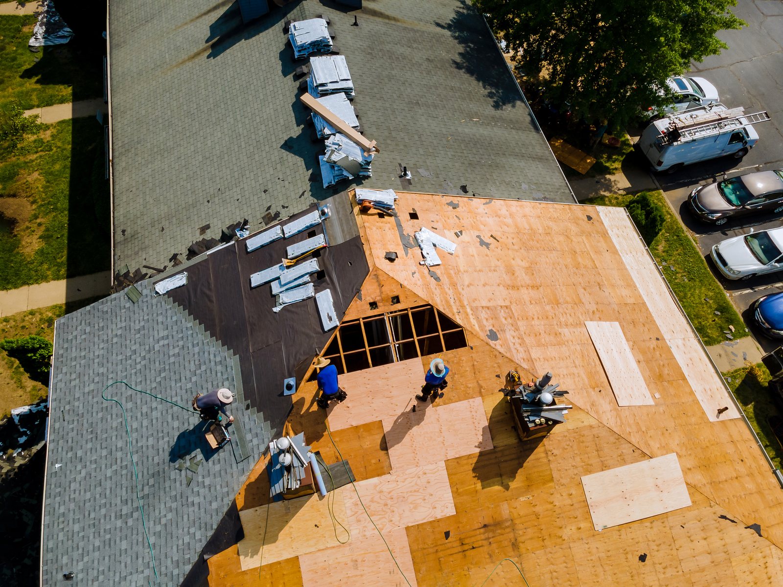Aerial view of a residential roof replacement in progress