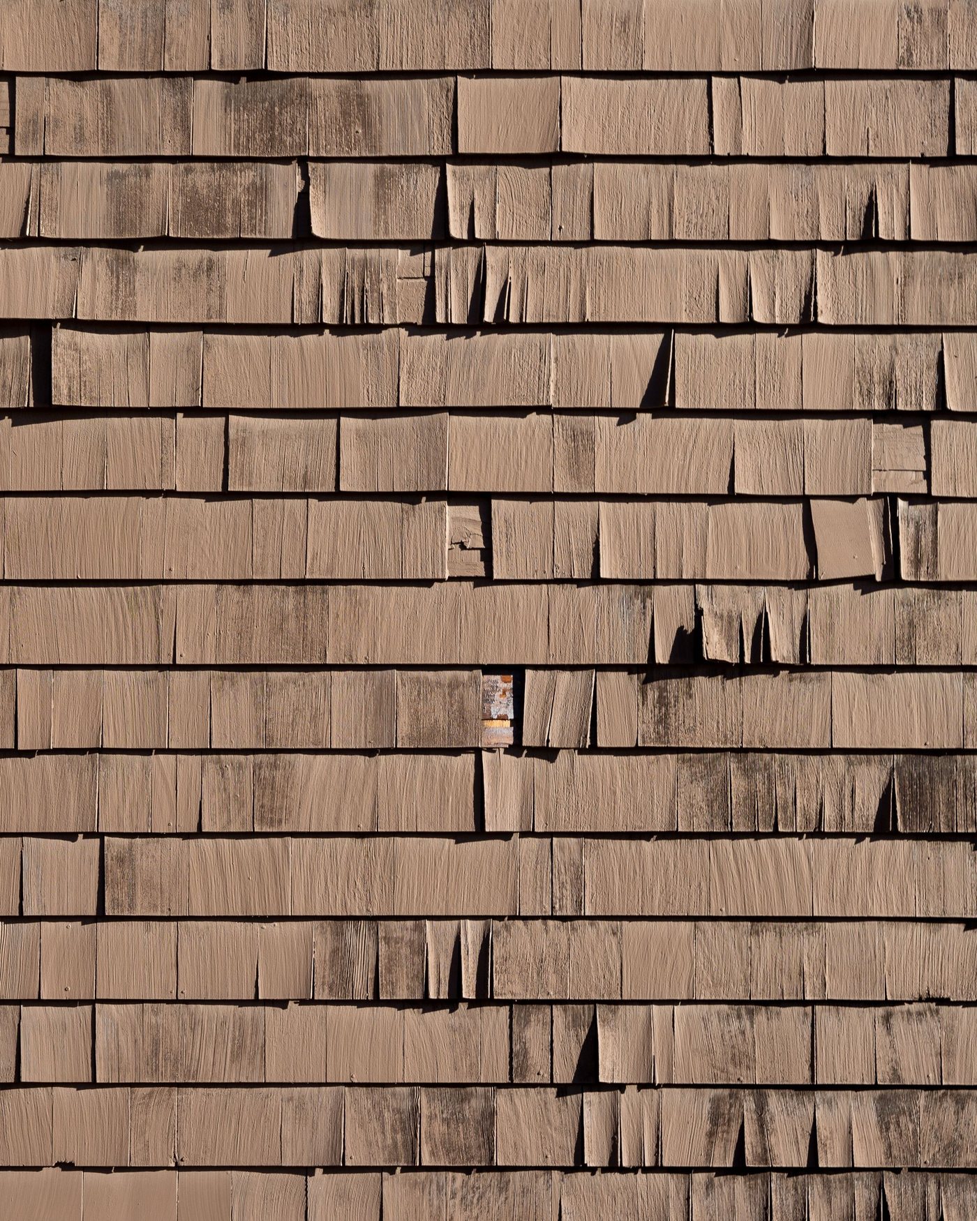 Close view of aged and worn roof shingles